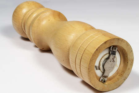 Foreshortened view of wooden spice grinderの写真素材