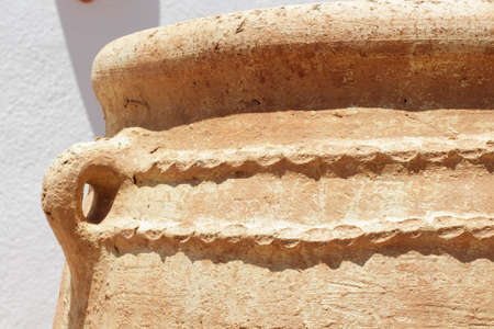 Detail of big pottery jar used to decorate a countryside yardの写真素材