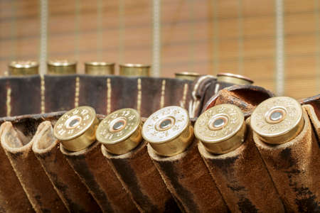 Cartridges in an old bandolierの写真素材