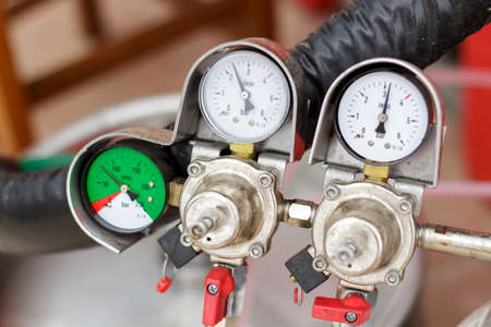 Nanometers of the nitrogen pressure regulator system on a draft beer faucet