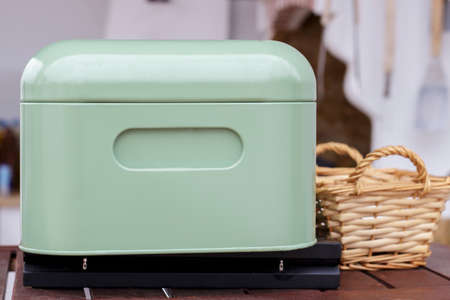 Green metal box for crockery in a kitchenの写真素材