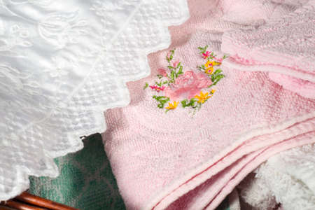 Detail of the embroidery of a pink hand towelの写真素材