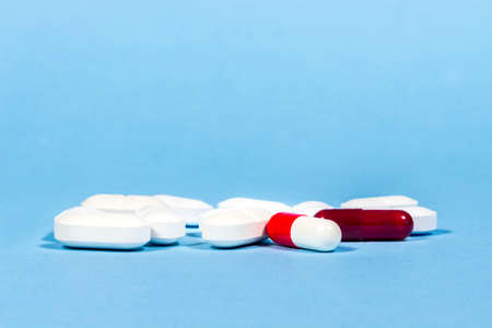 Different drugs on blue background