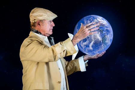 The Old Man looking with concern the situation of the planetの写真素材