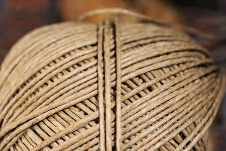 Close-up of spool of waxed hemp thread, used in shoemaking and other leather works