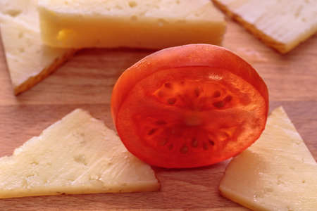 Detail of tomato slice in a Manchego cheese tapaの写真素材