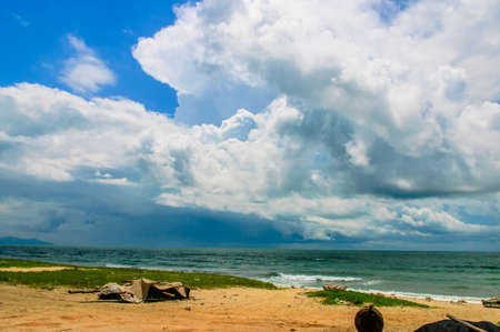 Waves coming from the sea, hitting the beachの写真素材