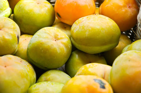 Autumn, a basket of ripe persimmons 