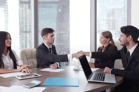 Business people working together at a meeting in modern office