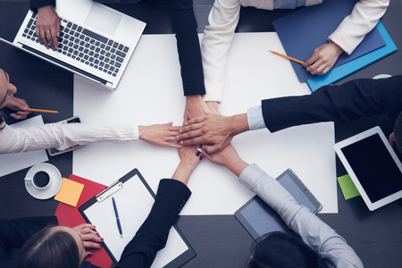 People with their hands together. Business team work conceptの写真素材