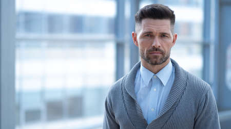 Portrait of mid adult business man in office