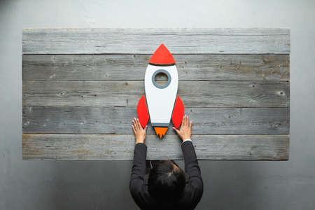 Business person launch space rocket, new business, success, business growth conceptの写真素材