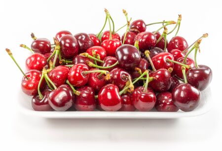 Beautiful cherry fruit on a white backgroundの写真素材