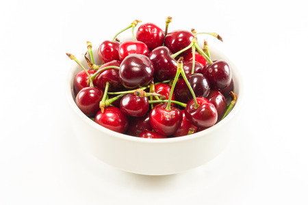 Beautiful cherry fruit on a white backgroundの写真素材