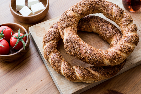 Turkish Bagel Simit with tea, cheese and cherry tomatoes. (ramadan concept)の写真素材