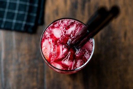 Alabama Slammer Cocktail with black straw. Beverage Concept.の写真素材