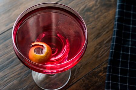 Boulevardier cocktail with lemon peel. Beverage Concept.