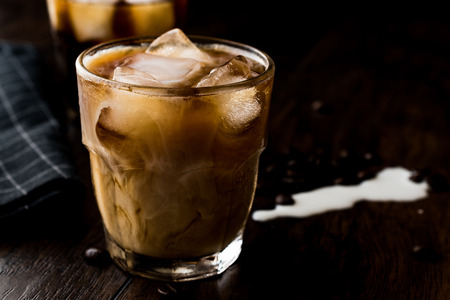 Cold brew coffee with milk and ice. (iced coffee). Organic Beverage.