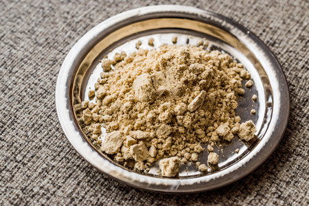 Ginger Powder on silver plate. (zencefil) Organic Concept.