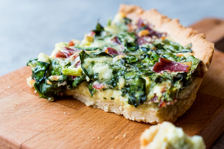 Quiche with Spinach, Chard, Pastrami and Cheese. Traditional Food.の写真素材