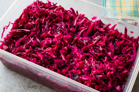 Shredded Red Cabbage Salad in Plastic bowl. / Pickle. Organic Food.の写真素材