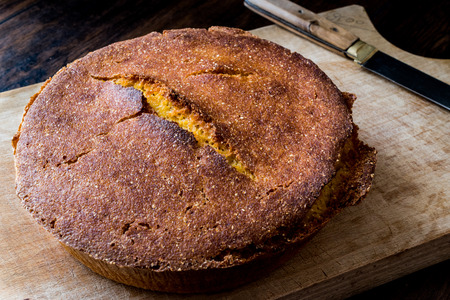 Turkish Cornbread  Misir Ekmegi on wooden surface (organic food)