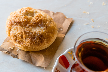 izmir boyoz / round borek with tea. Traditional food.