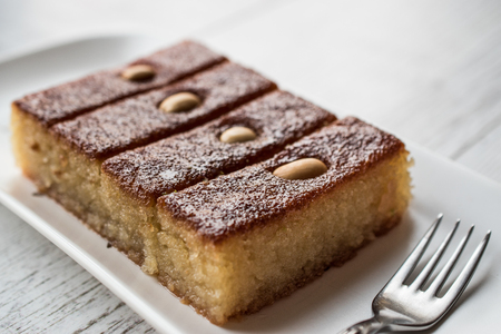 Turkish Dessert Sambali , Sambaba  or Damascus on a white wooden surface.の写真素材