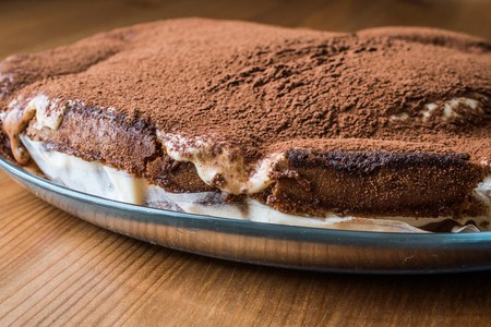 Homemade Tiramisu Cake on wooden surface. dessert concept.の写真素材