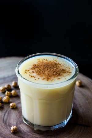 Boza or Bosa, traditional Turkish drink with roasted chickpea. Black backroundの写真素材