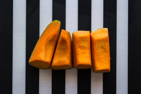 A pumpkin is a cultivar of a squash plant, most commonly of Cucurbita pepo, that is round, with smooth, slightly ribbed skin, and deep yellow to orange coloration.の写真素材