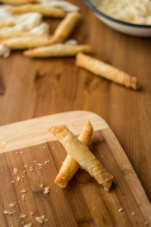 Borek is a family of baked filled pastries made of a thin flaky dough known as phyllo.