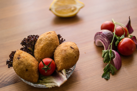 icli kofte  Fried kibbeh  Quibe with butter sauce.の写真素材