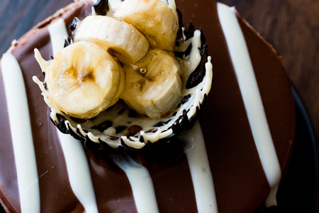 Whole Chocolate Cake with Banana. Dessert Concept.の写真素材