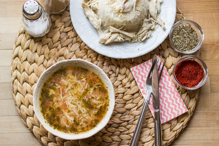 Traditional Turkish chicken broth soup with chicken on a rice. (tavuklu pilav) Pilafの写真素材