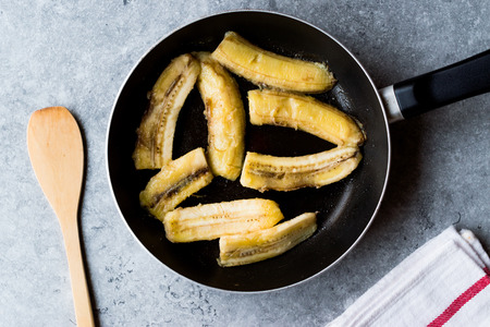 Homemade Sauteed Fried Bananas in Pan. Organic Food.の写真素材