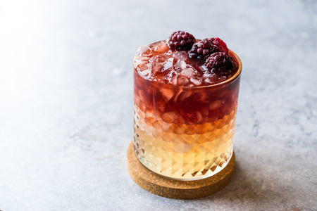 Bramble Cocktail with Blackberries and Crushed Ice. Beverage Conceptの写真素材