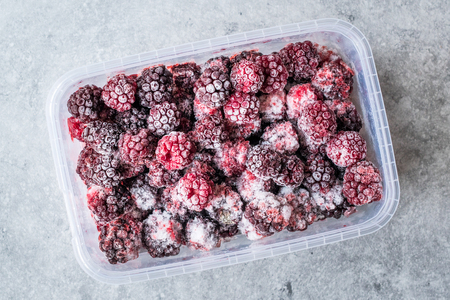 Frozen Blackberry in Plastic Box. Organic Fruit.の写真素材