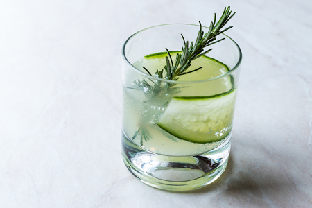 Rosemary Gin Gimlet Cocktail with Cucumber Slice. Beverage Concept.の写真素材