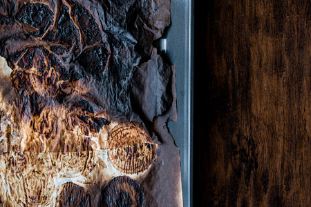 Burnt paper in the oven. Kitchen Concept.の写真素材