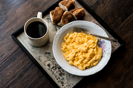 Turkish Breakfast with scrambled egg, simit (bagel) and tea or coffee. Traditional Breakfast.の写真素材
