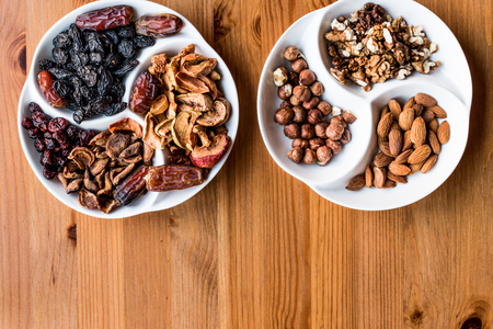Mix of Dried Fruits on wooden surface. copy space. Organic food.の写真素材