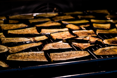 Cooking eggplant slices in the oven. organic food concept.の写真素材