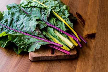 Raw Organic Rainbow Swiss Chard on wooden surface. Organic Food.の写真素材