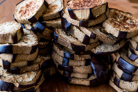Stack of Fried Eggplant on wooden surface. Organic Food.の写真素材