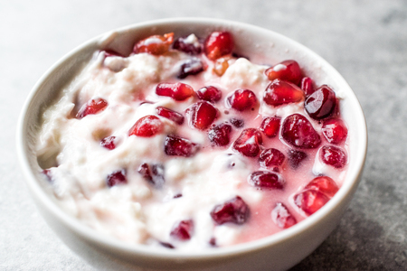 Homemade Yogurt with Pomegranate Seeds. Organic Food.の写真素材