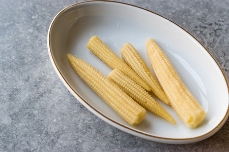 Sweet Baby Corn Pickle in Porcelain Bowl. Organic Food.