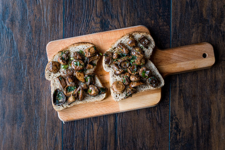 Mushroom Bruschetta Toast Sandwich on Wooden Surface. Organic Food.の写真素材