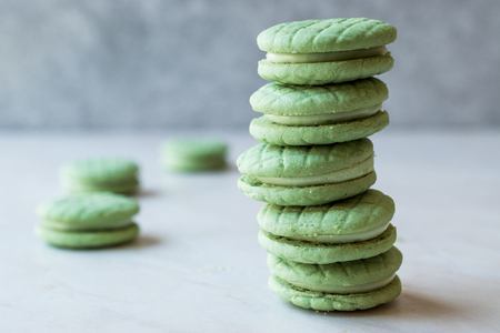 Cream Filled Green Round Lime Cookies / Macarons. Organic Food.の写真素材