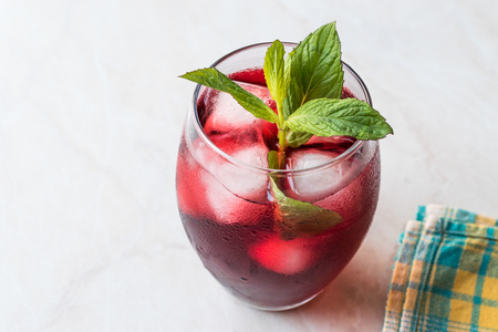Cold Brew Hibiscus Tea with ice and Mint Leaves. Summer Beverage.の写真素材